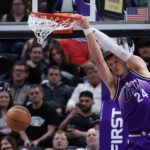 Feb 25, 2024; Salt Lake City, Utah, USA; Utah Jazz center Walker Kessler (24) dunks the ball against the San Antonio Spurs during the fourth quarter at Delta Center.
