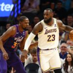 Feb 25, 2024; Phoenix, Arizona, USA; Los Angeles Lakers forward LeBron James (23) against Phoenix Suns forward Kevin Durant (35) at Footprint Center