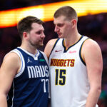 Mar 17, 2024; Dallas, Texas, USA; NBA; Dallas Mavericks guard Luka Doncic (77) speaks with Denver Nuggets center Nikola Jokic (15) during the second half at American Airlines Center.