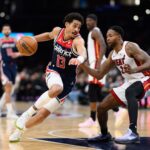 Mar 31, 2024; Washington, District of Columbia, USA; Washington Wizards guard Jordan Poole (13) drives to the basket against Miami Heat forward Haywood Highsmith (24) during the third quarter at Capital One Arena. Mandatory Credit: Reggie Hildred-USA TODAY Sports