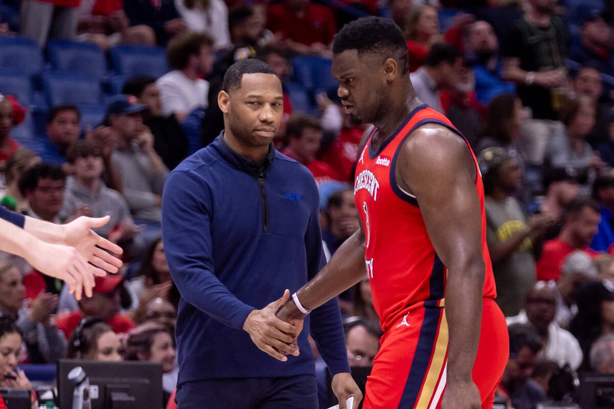 Apr 16, 2024; New Orleans, Louisiana, USA; New Orleans Pelicans forward Zion Williamson (1) reacts with New Orleans Pelicans head coach Willie Green on a time out in the first half against the Los Angeles Lakers during a play-in game of the 2024 NBA playoffs against the New Orleans Pelicans at Smoothie King Center.