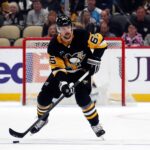 Apr 15, 2024; Pittsburgh, Pennsylvania, USA; Pittsburgh Penguins defenseman Erik Karlsson (65) skates with the puck against the Nashville Predators during the first period at PPG Paints Arena. Mandatory Credit: Charles LeClaire-USA TODAY Sports