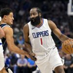 Apr 26, 2024; Dallas, Texas, USA; LA Clippers guard James Harden (1) looks to move the ball past Dallas Mavericks guard Josh Green (8) during the second quarter during game three of the first round for the 2024 NBA playoffs at the American Airlines Center. Mandatory Credit: Jerome Miron-USA TODAY Sports