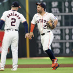 Jun 23, 2024; Houston, Texas, USA; Houston Astros third baseman Alex Bregman (2) and second baseman Jose Altuve (27) celebrate after defeating the Baltimore Orioles at Minute Maid Park. Mandatory Credit: Thomas Shea-USA TODAY Sports