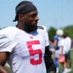 Jul 26, 2024; East Rutherford, NJ, USA; New York Giants linebacker Kayvon Thibodeaux (5) walks the sideline during training camp at Quest Diagnostics Training Center. Mandatory Credit: Lucas Boland-USA TODAY Sports