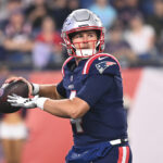 Aug 15, 2024; Foxborough, MA, USA; New England Patriots quarterback Bailey Zappe (4) looks to pass during the second half against the Philadelphia Eagles at Gillette Stadium. Mandatory Credit: Eric Canha-USA TODAY Sports