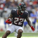 Aug 24, 2024; Houston, Texas, USA; Houston Texans running back Cam Akers (22) runs with the ball during the first quarter against the Los Angeles Rams at NRG Stadium.