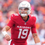 Aug 25, 2024; Denver, Colorado, USA; Arizona Cardinals quarterback Desmond Ridder (19) during the second half against the Denver Broncos at Empower Field at Mile High.