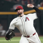 Sep 11, 2024; Phoenix, Arizona, USA; Arizona Diamondbacks pitcher Jordan Montgomery (52) throws against the Texas Rangers in the seventh inning at Chase Field. Mandatory Credit: Rick Scuteri-Imagn Images