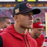 Sep 9, 2024; Santa Clara, California, USA; San Francisco 49ers running back Christian McCaffrey (23) watches injured from the sidelines in the second quarter against the New York Jets at Levi's Stadium. Mandatory Credit: David Gonzales-Imagn Images