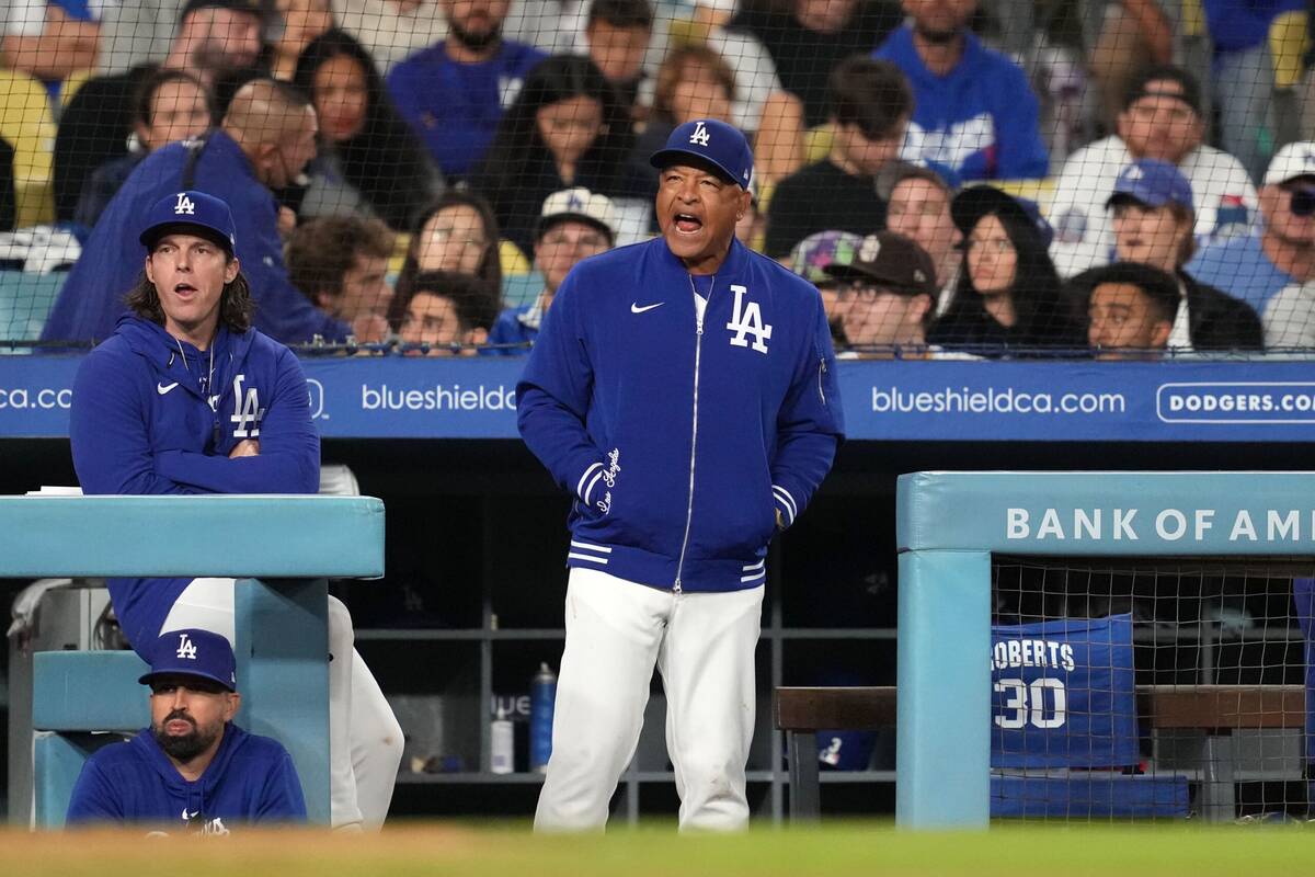 Sep 25, 2024; Los Angeles, California, USA; Los Angeles Dodgers manager Dave Roberts (30) reacts during the game against the San Diego Padres at Dodger Stadium. Mandatory Credit: Kirby Lee-Imagn Images