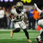 Sep 29, 2024; Atlanta, Georgia, USA; New Orleans Saints running back Alvin Kamara (41) runs the ball against the Atlanta Falcons in the fourth quarter at Mercedes-Benz Stadium. Mandatory Credit: Brett Davis-Imagn Images