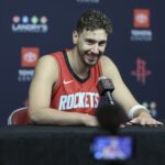 Sep 30, 2024; Houston, TX, USA; Houston Rockets center Alperen Sengun (28) speaks during Houston Rockets media day. Mandatory Credit: Troy Taormina-Imagn Images