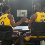 Sep 30, 2024; El Segundo, CA, USA; Los Angeles Lakers forward LeBron James (23) with son Bronny James (9) during media day at the UCLA Health Training Center. Mandatory Credit: Kirby Lee-Imagn Images