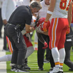 Sep 29, 2024; Inglewood, California, USA; Kansas City Chiefs wide receiver Rashee Rice (4) is assisted by medical staff after an injury in the first half against the Los Angeles Chargers at SoFi Stadium. Mandatory Credit: Jayne Kamin-Oncea-Imagn Images