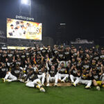 Oct 2, 2024; San Diego, California, USA; San Diego Padres players celebrate after winning the Wildcard round for the 2024 MLB Playoffs against the Atlanta Braves at Petco Park. Mandatory Credit: Denis Poroy-Imagn Images