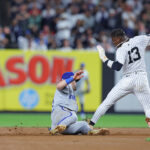Oct 5, 2024; Bronx, New York, USA; New York Yankees third base Jazz Chisholm Jr. (13) steals second base against Kansas City Royals second base Michael Massey (19) during the seventh inning during game one of the ALDS for the 2024 MLB Playoffs at Yankee Stadium. Mandatory Credit: Brad Penner-Imagn Images