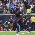 Oct 6, 2024; Houston, Texas, USA; Houston Texans wide receiver Nico Collins (12) makes a reception for a touchdown during the first quarter against the Buffalo Bills at NRG Stadium. Mandatory Credit: Troy Taormina-Imagn Images
