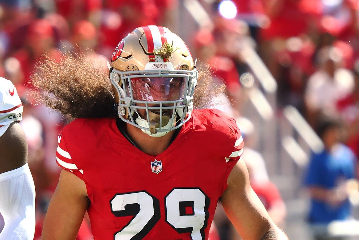 Oct 6, 2024; Santa Clara, California, USA; San Francisco 49ers safety Talanoa Hufanga (29) with grass in his helmet after a play against the Arizona Cardinals during the first quarter at Levi's Stadium. Mandatory Credit: Kelley L Cox-Imagn Images