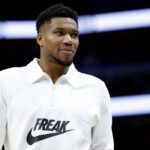 Oct 6, 2024; Detroit, Michigan, USA; Milwaukee Bucks forward Giannis Antetokounmpo (34) on the sideline in the first half against the Detroit Pistons at Little Caesars Arena. Mandatory Credit: Rick Osentoski-Imagn Images