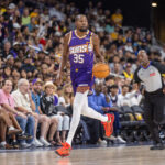 Oct 6, 2024; Palm Desert, California, USA; Phoenix Suns forward Kevin Durant (35) moves the ball against the Los Angeles Lakers during the first half at Acrisure Arena.