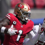 Oct 6, 2024; Santa Clara, California, USA; San Francisco 49ers wide receiver Deebo Samuel Sr. (1) carries the ball against the Arizona Cardinals during the first quarter at Levi's Stadium. Mandatory Credit: Darren Yamashita-Imagn Images