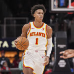 Oct 8, 2024; Atlanta, Georgia, USA; Atlanta Hawks forward Jalen Johnson (1) brings the ball up the court against the Indiana Pacers during the first half at State Farm Arena.