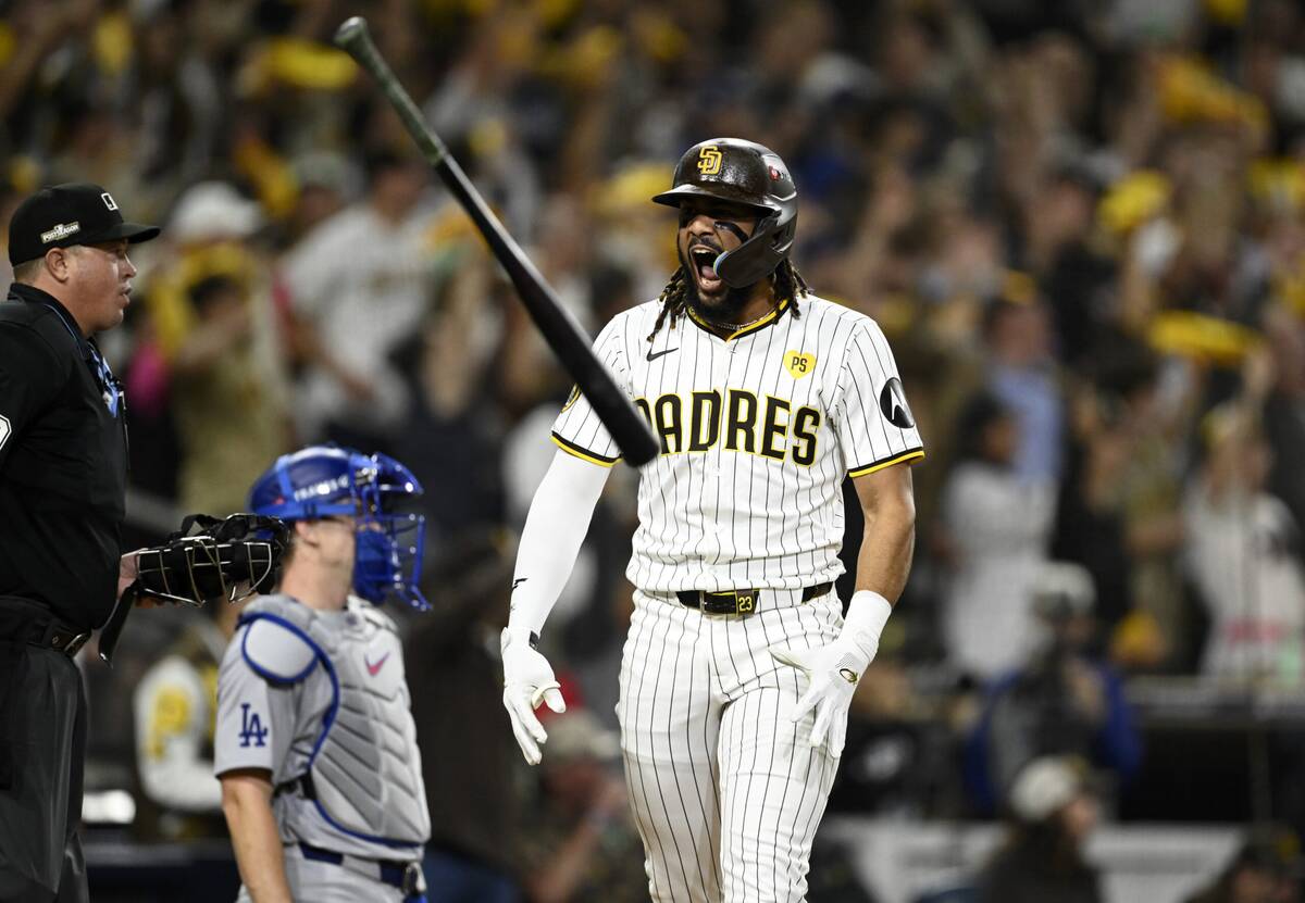 Oct 8, 2024; San Diego, California, USA; San Diego Padres outfielder Fernando Tatis Jr. (23) reacts after hitting a home run in the second inning against the Los Angeles Dodgers during game three of the NLDS for the 2024 MLB Playoffs at Petco Park. Mandatory Credit: Denis Poroy-Imagn Images