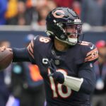 Oct 13, 2024; London, United Kingdom; Chicago Bears quarterback Caleb Williams (18) throws the ball against the Jacksonville Jaguars in the first half during an NFL International Series game at Tottenham Hotspur Stadium. Mandatory Credit: Kirby Lee-Imagn Images