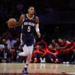 Oct 13, 2024; Miami, Florida, USA; New Orleans Pelicans guard Dejounte Murray (5) dribbles the basketball against the Miami Heat during the first quarter at Kaseya Center. Mandatory Credit: Sam Navarro-Imagn Images