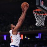 Oct 13, 2024; New York, New York, USA; New York Knicks forward Mikal Bridges (25) goes up for a dunk during the first half against the Minnesota Timberwolves at Madison Square Garden. Mandatory Credit: Vincent Carchietta-Imagn Images