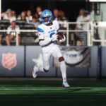 Oct 13, 2024; Arlington, Texas, USA; Detroit Lions wide receiver Jameson Williams (9) runs with the ball during the second half against the Dallas Cowboys at AT&T Stadium. Mandatory Credit: Kevin Jairaj-Imagn Images