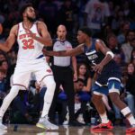 Oct 13, 2024; New York, New York, USA; NBA; New York Knicks center Karl-Anthony Towns (32) looks to pass as Minnesota Timberwolves guard Anthony Edwards (5) defends during the second half at Madison Square Garden. Mandatory Credit: Vincent Carchietta-Imagn Images