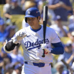 Oct 14, 2024; Los Angeles, California, USA; Los Angeles Dodgers designated hitter Shohei Ohtani (17) at bat in the first inning against the New York Mets during game two of the NLCS for the 2024 MLB Playoffs at Dodger Stadium. Mandatory Credit: Jayne Kamin-Oncea-Imagn Images