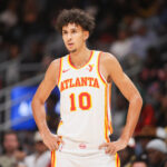 Oct 14, 2024; Atlanta, Georgia, USA; Atlanta Hawks forward Zaccharie Risacher (10) in action against the Philadelphia 76ers in the second quarter at State Farm Arena.
