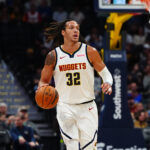 Oct 15, 2024; Denver, Colorado, USA; Denver Nuggets forward Aaron Gordon (32) during the first quarter against the Oklahoma City Thunder at Ball Arena.