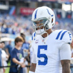 Oct 13, 2024; Nashville, Tennessee, USA; Indianapolis Colts quarterback Anthony Richardson (5) looks up into the stands as he walks off after warmups against the Tennessee Titans at Nissan Stadium. Mandatory Credit: Steve Roberts-Imagn Images