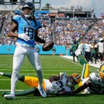 Tennessee Titans wide receiver DeAndre Hopkins scores a touchdown past Green Bay Packers cornerback Eric Stokes.