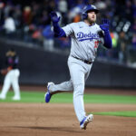 Oct 16, 2024; New York City, New York, USA; Los Angeles Dodgers third base Max Muncy (13) reacts after hitting a home run against the New York Mets in the ninth inning during game three of the NLCS for the 2024 MLB playoffs at Citi Field. Mandatory Credit: Wendell Cruz-Imagn Images