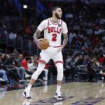 Oct 16, 2024; Chicago, Illinois, USA; Chicago Bulls guard Lonzo Ball (2) brings the ball up court against the Minnesota Timberwolves during the second half at United Center. Mandatory Credit: Kamil Krzaczynski-Imagn Images