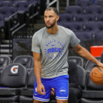 Oct 18, 2024; Orlando, Florida, USA; Orlando Magic guard Jalen Suggs (4) warms up before the game against the Philadelphia 76ers at Kia Center.