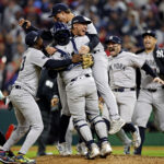 Oct 19, 2024; Cleveland, Ohio, USA; The New York Yankees celebrates after beating the Cleveland Guardians during game five of the ALCS for the 2024 MLB playoffs at Progressive Field. Mandatory Credit: Scott Galvin-Imagn Images