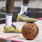 Oct 15, 2024; Las Vegas, Nevada, USA; Golden State Warriors guard Gary Payton II (0) wears Nike shoes against the Los Angeles Lakers in the fourth quarter during a preseason game at T-Mobile Arena. Mandatory Credit: Candice Ward-Imagn Images