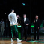 Oct 22, 2024; Boston, Massachusetts, USA; Boston Celtics forward Jayson Tatum (0) is presented with a championship ring during the opening night banner raising ceremony before the start of the game against the New York Knicks at TD Garden.