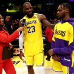 Bronny LeBron Oct 22, 2024; Los Angeles, California, USA; NBA on TNT sideline reporter Taylor Rooks interviews Los Angeles Lakers forward LeBron James (23) and guard Bronny James (9) after they defeated the Minnesota Timberwolves at Crypto.com Arena. Mandatory Credit: Jason Parkhurst-Imagn Images