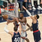 Oct 23, 2024; Inglewood, California, USA; Phoenix Suns forward Kevin Durant (35) shoots the ball against LA Clippers center Ivica Zubac (40) and guard Amir Coffey (7) in the first half at Intuit Dome.