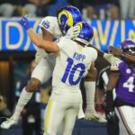 Oct 24, 2024; Inglewood, California, USA; Los Angeles Rams wide receiver Demarcus Robinson (15) celebrates with wide receiver Cooper Kupp (10) after scoring on a 25-yard touchdown reception against the Minnesota Vikings in the second half at SoFi Stadium. Mandatory Credit: Kirby Lee-Imagn Images