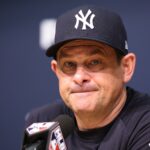 Oct 25, 2024; Los Angeles, California, USA; New York Yankees manager Aaron Boone (17) talks with the media before the game against the Los Angeles Dodgers during game one of the 2024 MLB World Series at Dodger Stadium. Mandatory Credit: Kiyoshi Mio-Imagn Images