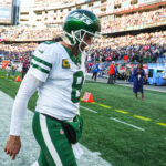 Oct 27, 2024; Foxborough, Massachusetts, USA; New York Jets quarterback Aaron Rodgers (8) exits the field after being defeated by the New England Patriots in the second half at Gillette Stadium. Mandatory Credit: David Butler II-Imagn Images