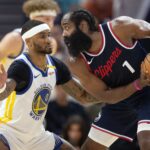Oct 27, 2024; San Francisco, California, USA; Golden State Warriors guard Gary Payton II (0) guards Los Angeles Clippers guard James Harden (1) during the first quarter at Chase Center. Mandatory Credit: D. Ross Cameron-Imagn Images